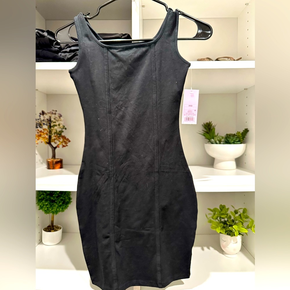Tight black short woman’s dress